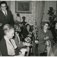 Il presidente della Camera dei Deputati Alessandro Pertini dona dei fiori alle deputate in occasione della festa della donna